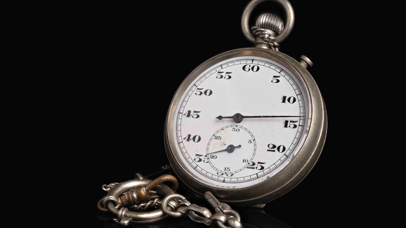 A vintage stopwatch used as a contraction timer, illustrating how to time contractions during labor